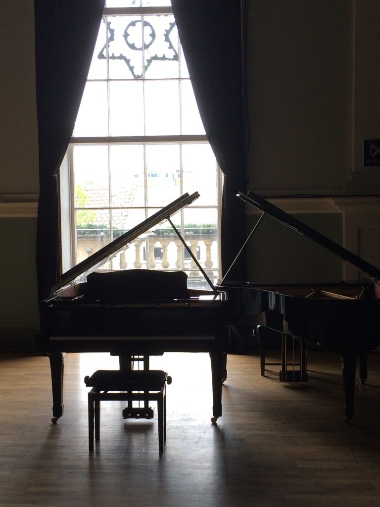 Yamaha grand piano at Stroud Subscription Rooms