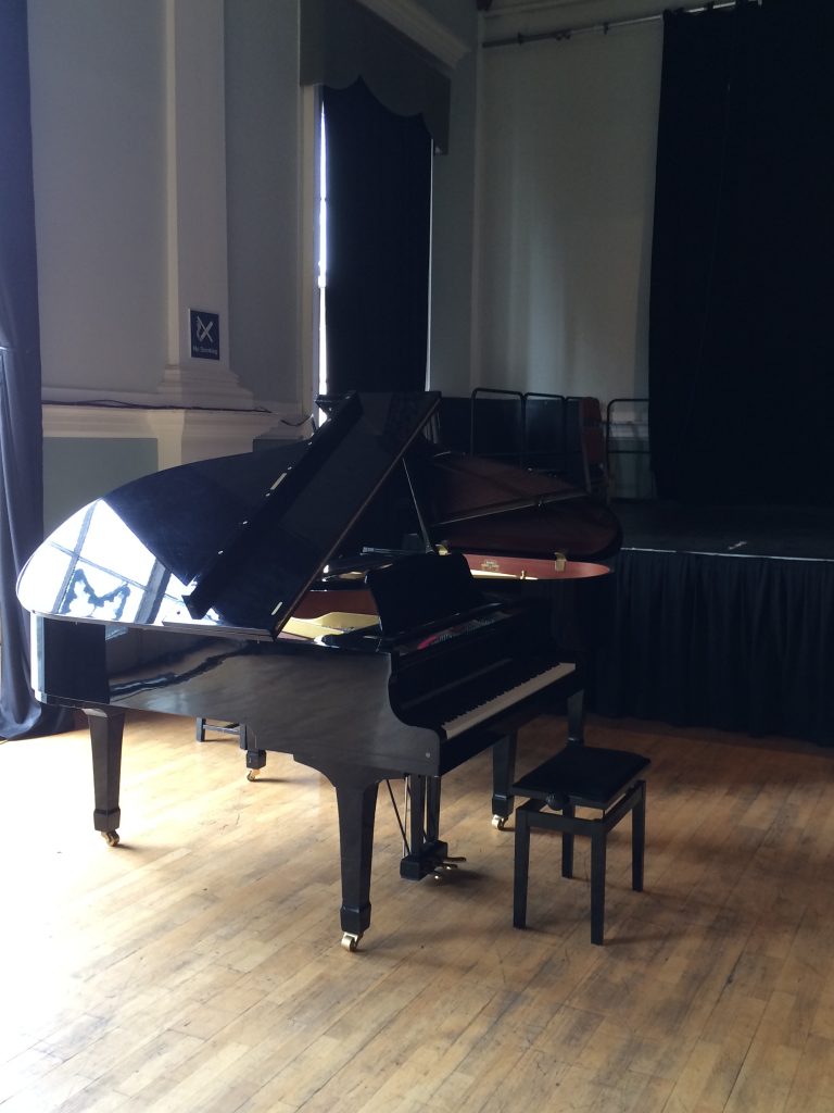 Yamaha grand piano at Stroud Subscription Rooms