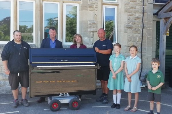 Piano delivery to Woodchester Endowed School