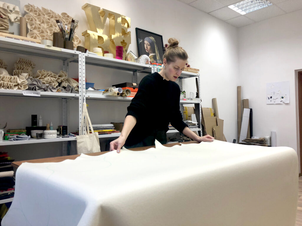 Anka prepares the fabric for production